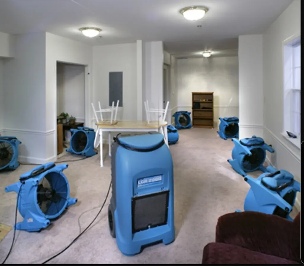 Air movers and dehumidifier setup for Water Damage Restoration in Rosamond